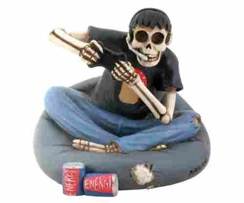 Skull Gamer Sitting on Cushion Collectible Figurine